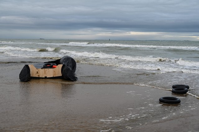Life jackets, buoys and a deflated inflatable boat are seen after a failed attempt by migrants to illegally cross the English Channel to reach Britain, on the beach of Sangatte, near Calais, northern France, on December 4, 2024. (Photo by Bernard Barron/AFP Photo)