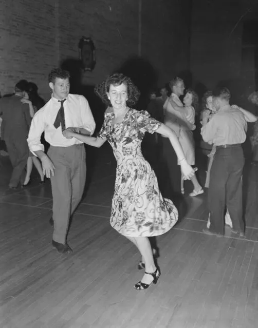 A young couple is dancing at a  Fourth of July celebration in Price, Utah, July 3, 1946. (Photo by Smith Collection/Gado/Getty Images).