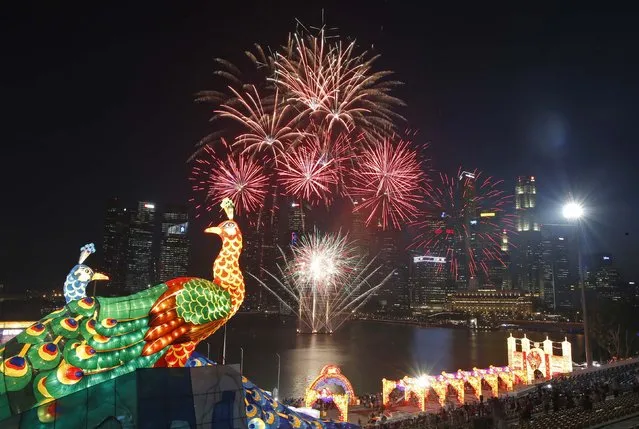 Fireworks explode at the River Hongbao Lunar New Year Celebrations along Marina Bay in Singapore February 17, 2015. (Photo by Edgar Su/Reuters)