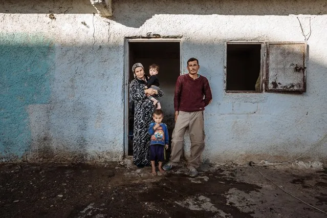 Zonan and Mustapha’s family live in a former stable for horses which they share with other families in Salinufra, Turkey. In the stable, each family uses a single stall, intended for one horse, with no heating, water, or electricity. Originally from Kobane, the family fled to escape the ongoing war in Syria and they have been living in the stable for the past six months. (Photo by Muse Mohammed/IOM)