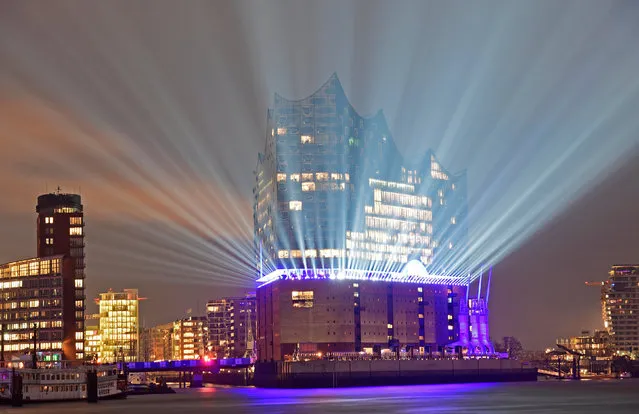 The “Elbphilharmonie” (Philharmonic Hall), which will open its doors to public on January 11, 2017, is illuminated during a light test in downtown Hamburg, Germany, January 9, 2017. (Photo by Fabian Bimmer/Reuters)