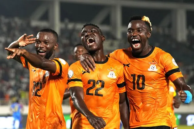 Zambia's Kings Kangwa, center, celebrates with teammates after scoring his sides first goal during the African Cup of Nations Group F soccer match between DR Congo and Zambia in San Pedro, Ivory Coast, Wednesday, January 17, 2024. (Photo by Themba Hadebe/AP Photo)