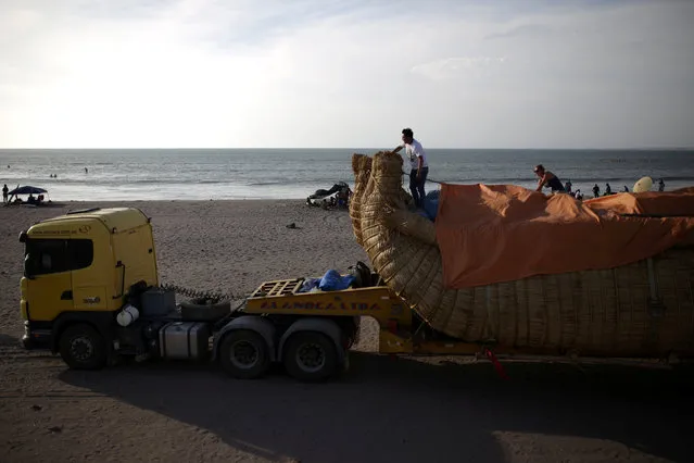 The “Viracocha III”, a boat made only from reeds, is pictured after arriving to a beach on the Pacific shores in the northern Chile as part its preparation to cross to Australia on an expected six-month journey, in Arica, Chile February 9, 2017. (Photo by Ibar Silva/Reuters)