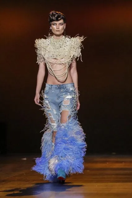 A model walks the runway for the Blonds show during Fashion Week in New York on February 13, 2017. (Photo by Kena Betancur/AFP Photo)