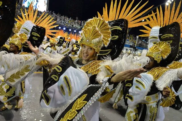 Revelers of the Vai-Vai samba school perform during the first night of carnival parade at the Sambadrome in Sao Paulo, Brazil on March 01, 2014. (Photo by Nelson Almeida/AFP Photo)