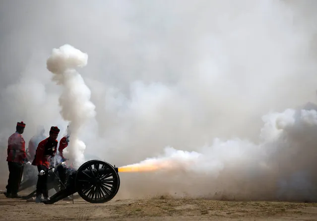 Members of Nepalese army fire a cannon during the rehearsal for the upcoming Army Day celebration at Tundhikhel in Kathmandu, Nepal February 22, 2017. (Photo by Navesh Chitrakar/Reuters)