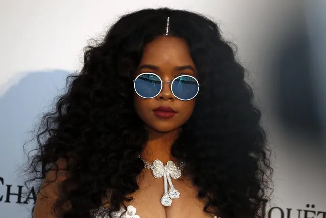 Singer H.E.R. poses for photographers upon arrival at the amfAR, Cinema Against AIDS, benefit at the Hotel du Cap-Eden-Roc, during the 72nd international Cannes film festival, in Cap d'Antibes, southern France, Thursday, May 23, 2019. (Photo by Eric Gaillard/Reuters)