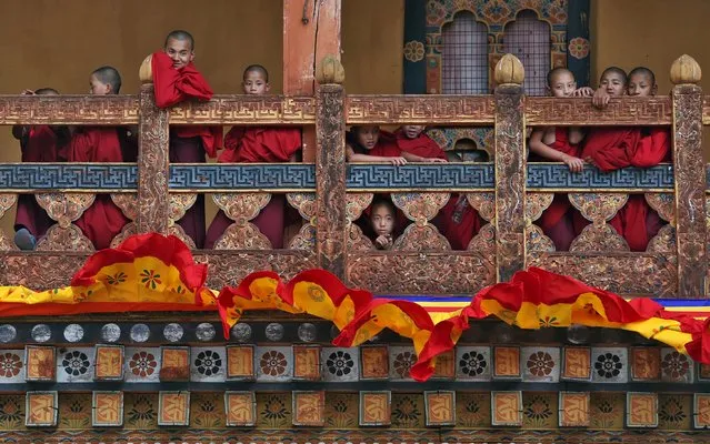 Monks are pictured inside the Punakha Dzong, Bhutan, April 17, 2016. (Photo by Cathal McNaughton/Reuters)