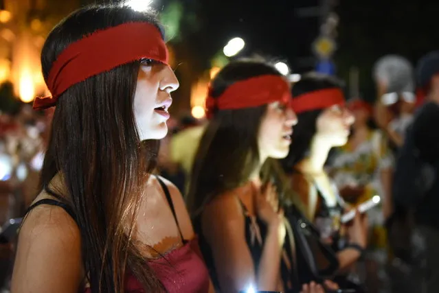 Georgian women take part in an opposition rally near the country's parliament in Tbilisi on June 26, 2019. (Photo by Mzia Saganelidze/Radio Free Europe/Radio Liberty)