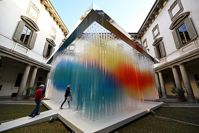 Visitors look at the artwork “Straordinaria”, an immersive installation presented by the Italian company Elica as part of the Fuorisalone 2024 event, on the eve of the Milan Design Week, in Milan, on April 15, 2024. (Photo by Gabriel Bouys/AFP Photo)