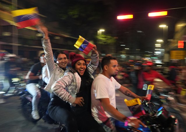 Supporters celebrate after the electoral authority announced that Venezuelan President Nicolas Maduro has won a third term, during the presidential election, in Caracas, Venezuela on July 29, 2024. (Photo by Alexandre Meneghini/Reuters)