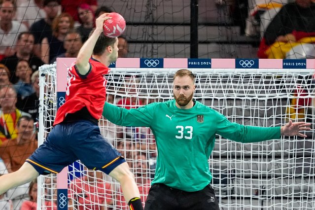 Spain's Daniel Fernandez shoots on goal during a semifinal handball match between Germany and Spain at the 2024 Summer Olympics, Friday, August 9, 2024, in Villeneuve-d'Ascq, France. (Photo by Aaron Favila/AP Photo)