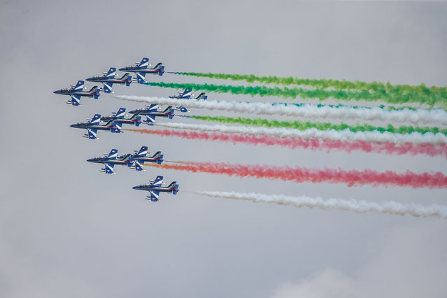 Italian Air Force Frecce Tricolori planes are seen flying over New York City in the United States on Monday, August 12, 2024. The performance, in honor of the 500th anniversary of Giovanni da Verrazzano's expedition, brought the world's largest acrobatic squadron for an unforgettable display. (Photo by William Volcov/Rex Features/Shutterstock)