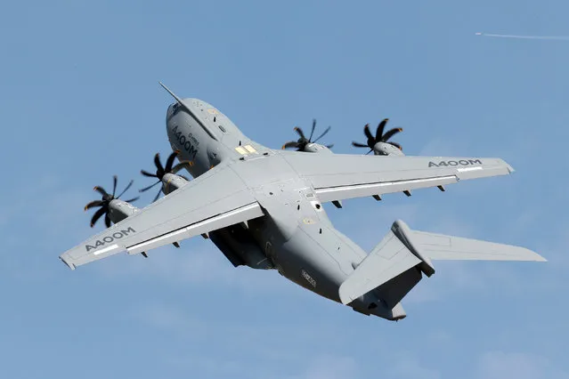An Airbus A400M military aircraft participates in a flying display during the 51st Paris Air Show at Le Bourget airport near Paris, France, June 16, 2015. (Photo by Pascal Rossignol/Reuters)