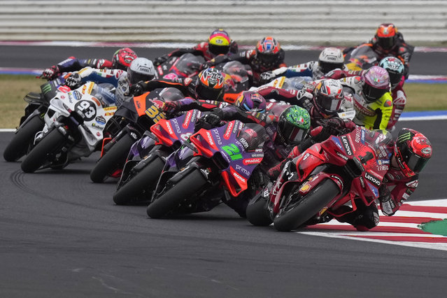 MotoGP rider Francesco Bagnaia of Italy leads into a curve during the first lap of the San Marino Motorcycle Grand Prix at the Misano circuit in Misano Adriatico, Italy, Sunday, September 8, 2024. (Photo by Antonio Calanni/AP Photo)