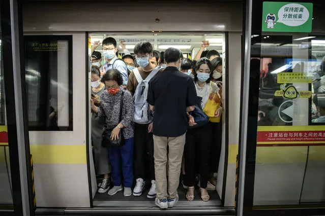 Citizens take the subway in Guangzhou, Guangdong province of China on May 26, 2022. (Photo by Stringer/Anadolu Agency via Getty Images)