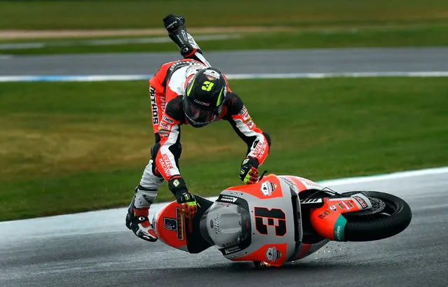 Kiefer Racing Moto2 rider Lukas Tulovic of Germany crashes during a practice session at Phillip Island on October 25, 2019, ahead of the MotoGP Australian Grand Prix. (Photo by William West/AFP Photo)