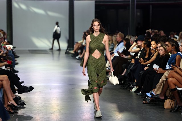 Models present creations for British fashion label JW Anderson during the catwalk presentation for their Spring/Summer 2024 collection, during London Fashion Week in London, on September 16, 2023. (Photo by Henry Nicholls/AFP Photo)
