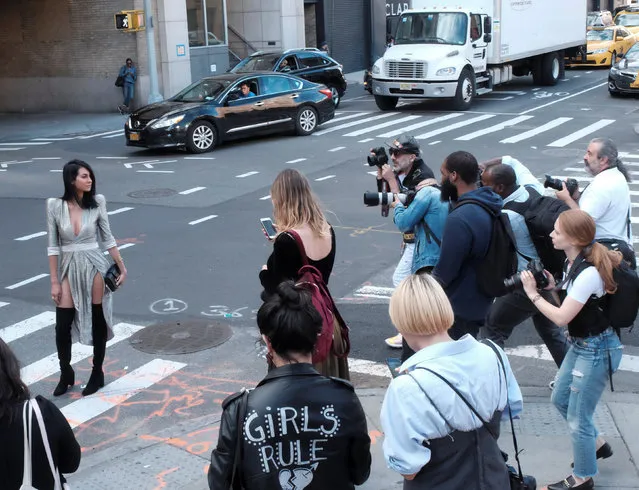 Photographers document street style outside Skylight Clarkson Square during New York Fashion Week in the Manhattan borough of New York City, U.S., September 8, 2017. (Photo by Brenna Weeks/Reuters)