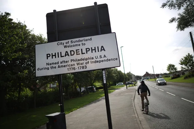 A cyclist passes a raod sign on August 7, 2013 in Philadelphia, England. The town was named after Philadelphia USA by a local colliery owner after the British captured the city during the American War of Independence. (Photo by Peter Macdiarmid/Getty Images)