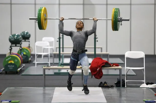 2016 Rio Olympics, Copacabana on July 29, 2016. Weightlifter Roilya Ranaivosoa from Mauritius practices. (Photo by Athit Perawongmetha/Reuters)