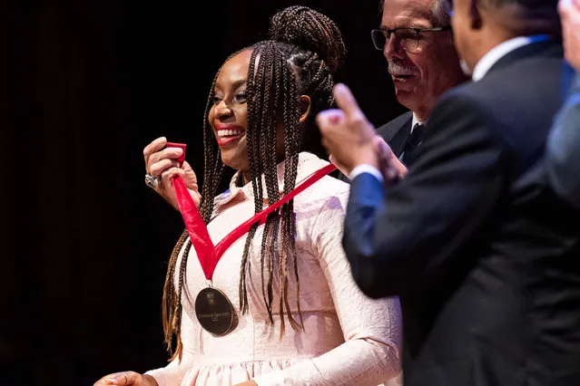 Nigerian writer Chimamanda Ngozi Adichie receives the W.E.B Du Bois Medal, Harvard’s highest honor in the field of African and African American studies at Harvard University’s Sanders theatre in Cambridge, Massachusetts on October 6, 2022. This year’s honorees include Kareem Abdul-Jabbar, writer Chimamanda Ngozi Adichie, actress Laverne Cox, philanthropist Agnes Gund, businessman Raymond J. McGuire, former Massachusetts Governor Deval Patrick and artist Betye Saar. The awards have not been given since 2019. (Photo by Joseph Prezioso/AFP Photo)