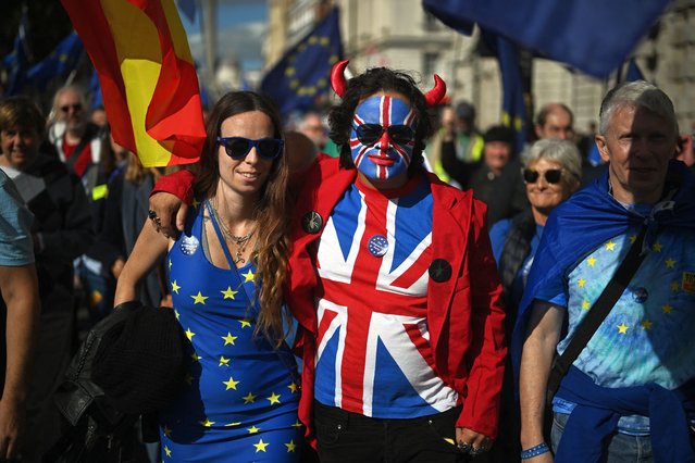 Protesters attend a National Rejoin March, as they walk towards the Houses of Parliament in central London on September 28, 2024, calling for the UK to rejoin the European Union. (Photo by Ben Stansall/AFP Photo)