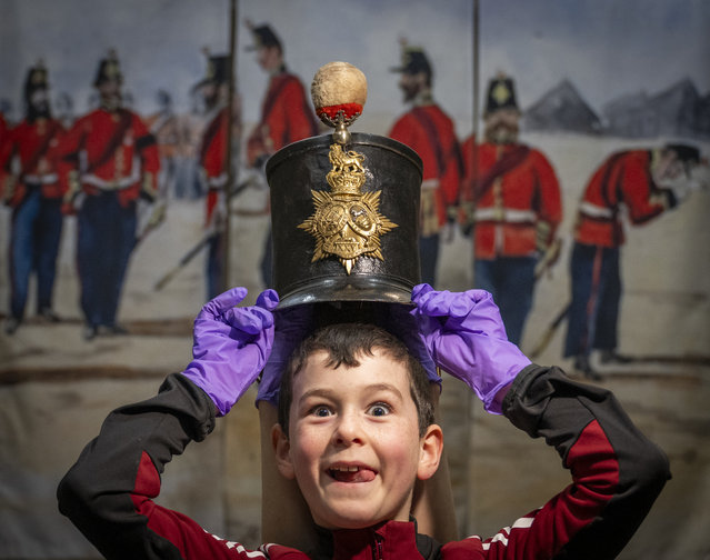 John Higgins on March 18, 2025 at Hawick Museum in the Scottish Borders with a black leather shako, dating from about 1845. It is one of the oldest pieces of uniform in their collection. (Photo by Phil Wilkinson)