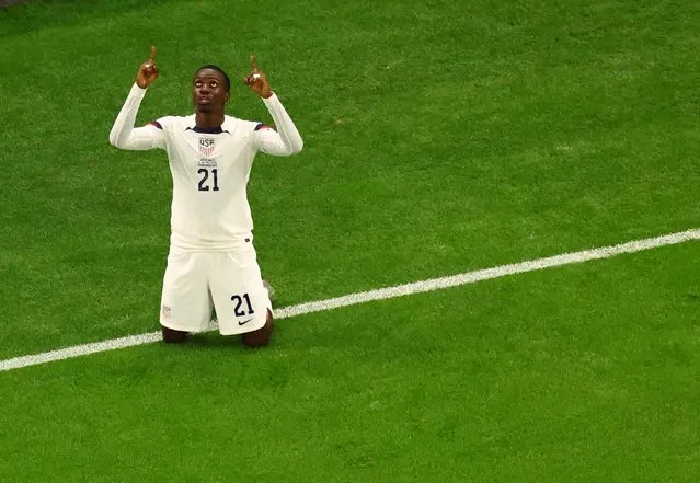 Timothy Weah of USA celebrates his goal during the FIFA World Cup Qatar 2022 Group B match between USA and Wales at Ahmad Bin Ali Stadium on November 21, 2022 in Doha, Qatar. (Photo by Fabrizio Bensch/Reuters)