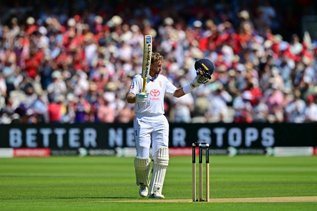 England's Joe Root reacts to reaching his century on the second day of the third cricket test match between England and India at Lord's cricket ground in London, on July 11, 2025. (Photo by Ben Stansall/AFP Phoot)