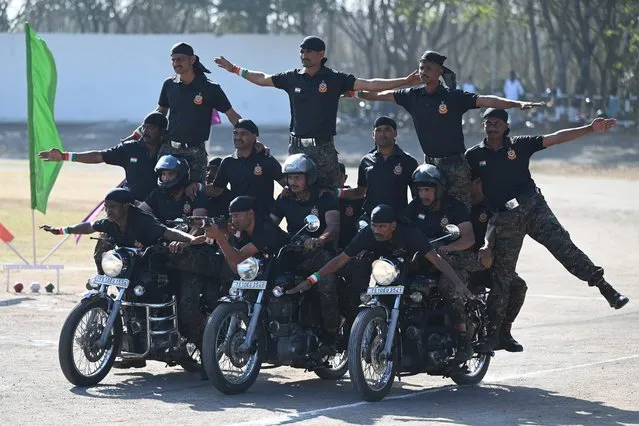 Railway Protection Force (RPF) personnel perform stunts during Republic Day celebrations at the railway sports complex ground in Secunderabad, the twin city of Hyderabad on January 26, 2023. (Photo by Noah Seelam/AFP Photo)