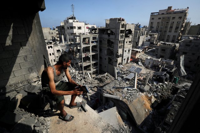 A Palestinian looks on at the site of Thursday's Israeli strike that damaged and destroyed residential buildings, at Shati (Beach) refugee camp, in Gaza City, on July 4, 2025. (Photo by Mahmoud Issa/Reuters)
