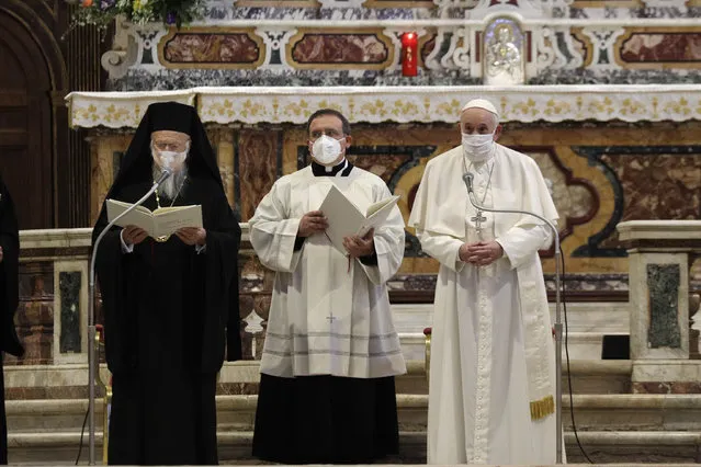 Pope Francis and Bartolomew I, Patriarch of Constantinopolis, attend a inter-religious ceremony for peace in the Basilica of Santa Maria in Aracoeli, in Rome Tuesday, October 20, 2020. (Photo by Gregorio Borgia/AP Photo)