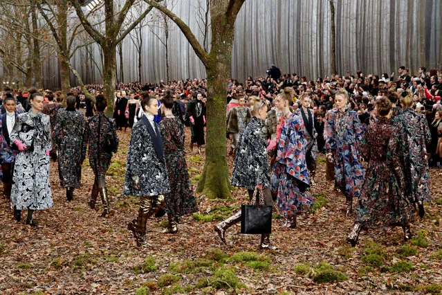 Models present creations by German designer Karl Lagerfeld as part of his Autumn/Winter 2018-2019 women's ready-to-wear collection show for fashion house Chanel at the Grand Palais during Paris Fashion Week, France March 6, 2018. (Photo by Pascal Rossignol/Reuters)