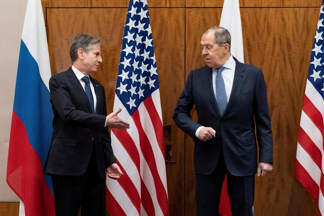 US Secretary of State Antony Blinken (L) greets Russian Foreign Minister Sergey Lavrov before their meeting, in Geneva, on January 21, 2022. Washington and Moscow's top diplomats meet in Geneva in a last-ditch bid for a solution over Ukraine, with the United States increasingly fearing that Russia will invade despite warnings of severe reprisals. (Photo by Alex Brandon/Pool via AFP Photo)