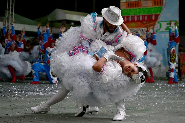 Revelers perform during the June Festival in Juazeiro, Bahia, Brazil on June 09, 2024. The June Festival is a Catholic tradition which celebrates the nativity of St. John the Baptist. (Photo by Pablo Porciúncula/AFP Photo)