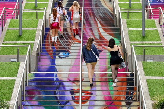 People walk on the 'Swiftie Steps' ahead of a Taylor Swift concert, following the cancellation of three Taylor Swift concerts in Vienna because of a planned attack, at Wembley Stadium in London, Britain on August 15, 2024. (Photo by Toby Melville/Reuters)