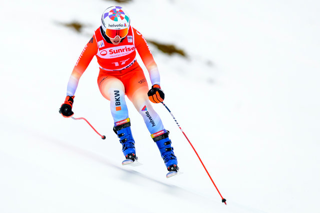 Michelle Gisin of Switzerland in action before a fall during the women's Downhill training race at the Alpine Skiing FIS Ski World Cup, in St. Moritz, Switzerland, Thursday, December 11, 2025. (Photo by Jean-Christophe Bott/Keystone via AP Photo)