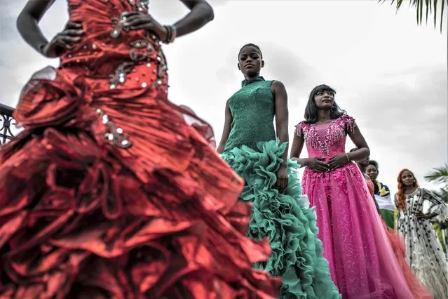 Models present dresses by Central African Republic fashion designer Ketura Kimono Milca during the ninth edition of the Liputa fashion show in Goma, Democratic Republic of Congo, Saturday June 24, 2023. (Photo by Moses Sawasawa/AP Photo)