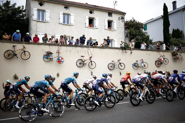 Spectators cheer Tour de France riders during stage 4 of the race, from Dax to Nogaro  on July 4, 2023. (Photo by Stephane Mahe/Reuters)