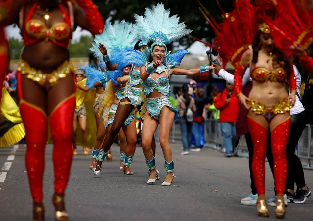 Revellers take part in the Notting Hill Carnival in London, Britain on August 27, 2018. (Photo by Henry Nicholls/Reuters)