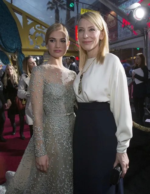 Cast members Cate Blanchett (R) and Lily James pose at the premiere of "Cinderella" at El Capitan theatre in Hollywood, California March 1, 2015. The movie opens in the U.S. on March 13. REUTERS/Mario Anzuoni  (UNITED STATES - Tags: ENTERTAINMENT)