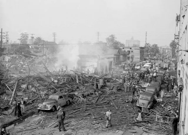 This is a general view of the wreckage of a two-story building that housed the O'Connor Electro-Plating Company, which was destroyed in a horrific explosion in downtown Los Angeles, February 20, 1947.  The blast killed more than 30 and injured over one hundred others. (Photo by AP Photo)