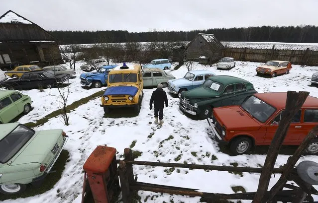 Collector Danila Tsitovich, who finds and restores old cars and motorcycles, is seen at his base in the village of Zabroddzie, Belarus December 20, 2016. (Photo by Vasily Fedosenko/Reuters)