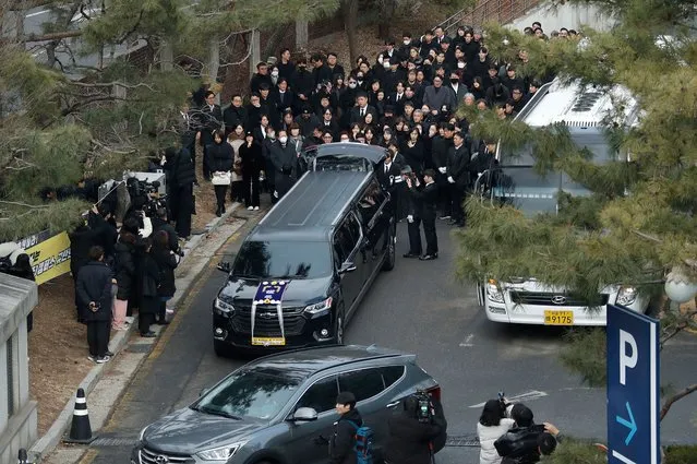 The hearse carrying the casket of late South Korean actor Lee Sun-kyun leaves a funeral hall after his funeral ceremony at the Seoul National University Hospital in Seoul on December 29, 2023. The late South Korean actor Lee Sun-kyun's body was transported from the funeral home to a crematorium in a private ceremony on December 29, with his death raising questions about alleged harsh police practices and media sensationalism. (Photo by Korea Pool/AFP Photo)