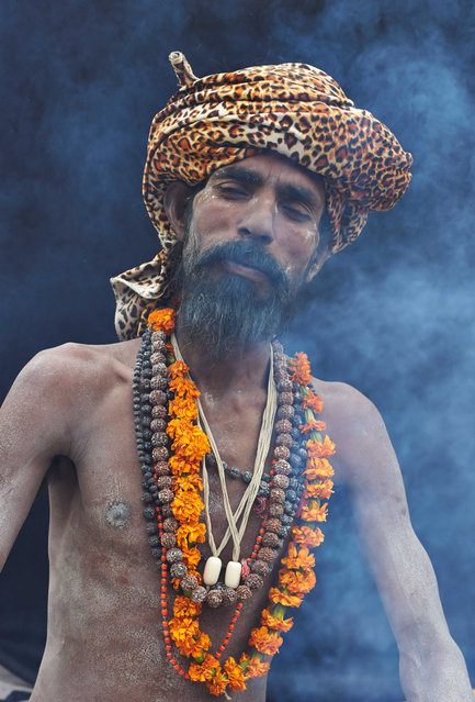 A holy man in a turban and decorations, taken in Kathmandu, Nepal. (Photo by Jan Moeller Hansen/Barcroft Images)
