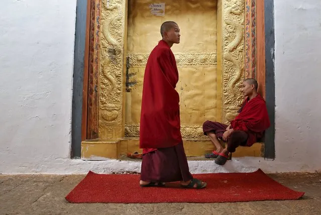 Monks are pictured inside the Punakha Dzong, Bhutan, April 17, 2016. (Photo by Cathal McNaughton/Reuters)