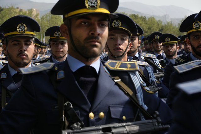 Iranian army members march during Army Day parade at a military base in northern Tehran, Iran, Wednesday, April 17, 2024. In the parade, Iranian President Ebrahim Raisi warned that the “tiniest invasion” by Israel would bring a “massive and harsh” response, as the region braces for potential Israeli retaliation after Iran's attack over the weekend. (Photo by Vahid Salemi/AP Photo)