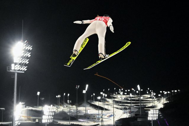 Slovenia's Ursa Bogataj practices during the Ski Jumping Women's Normal Hill official training 1, on February 3, 2022 at the Zhangjiakou National Ski Jumping Centre ahead of the Beijing 2022 Winter Olympic Games. (Photo by Christof Stache/AFP Photo)