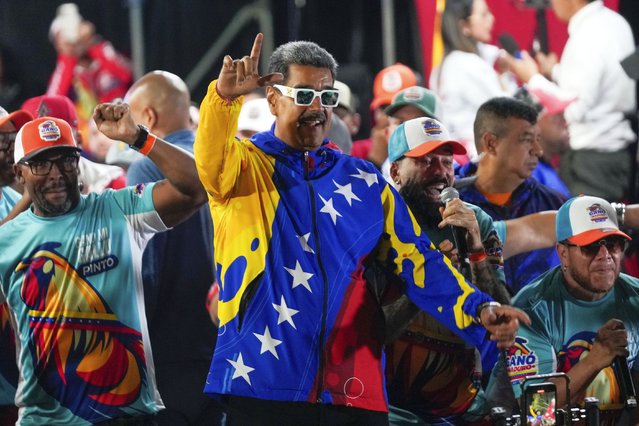 President Nicolas Maduro dances outside the Miraflores presidential palace after electoral authorities declared him the winner of the presidential election in Caracas, Venezuela, Monday, July 29, 2024. (Photo by Fernando Vergara/AP Photo)